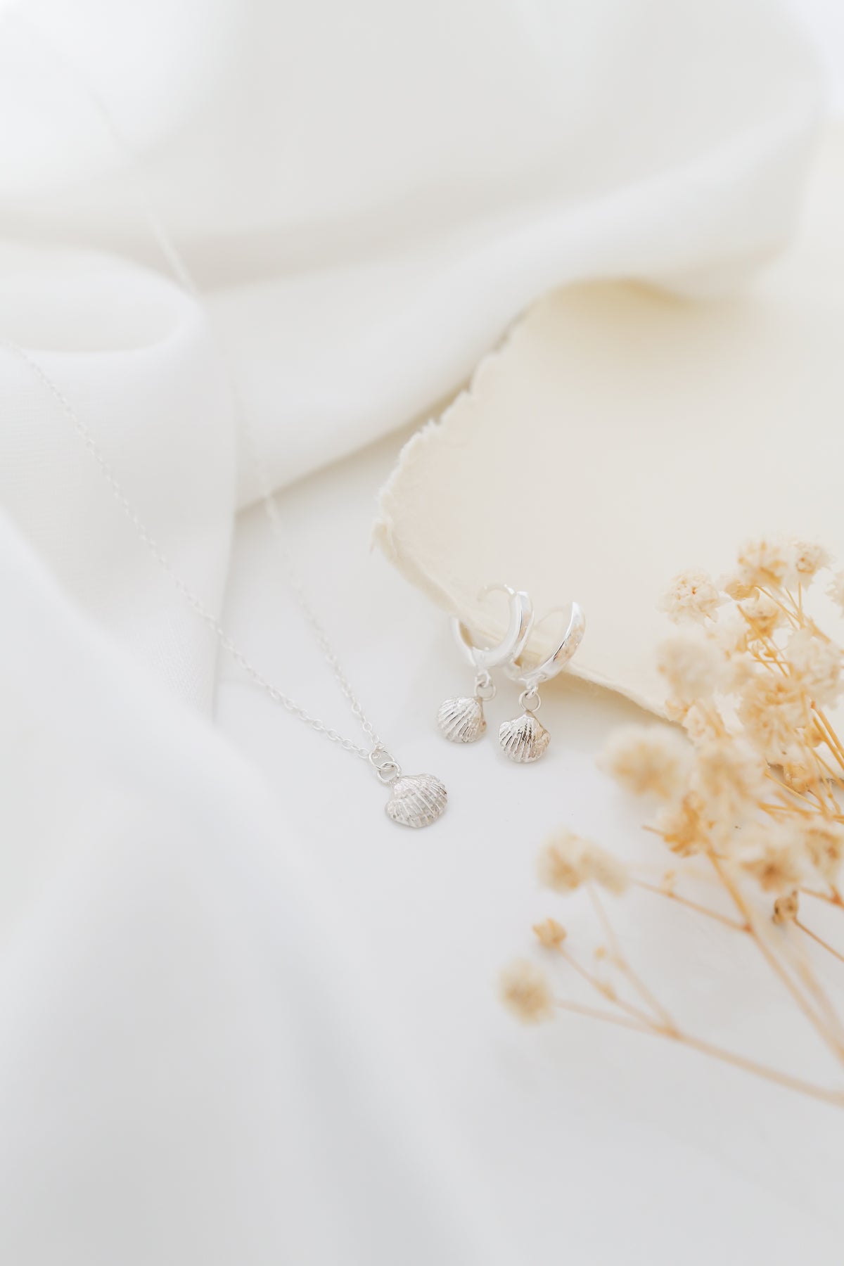 Sterling silver shell hoops