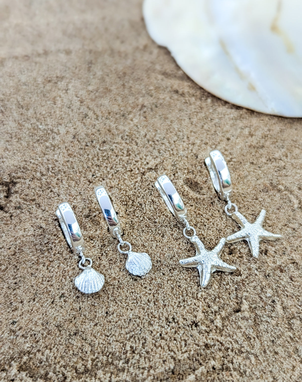 Sterling silver shell hoops