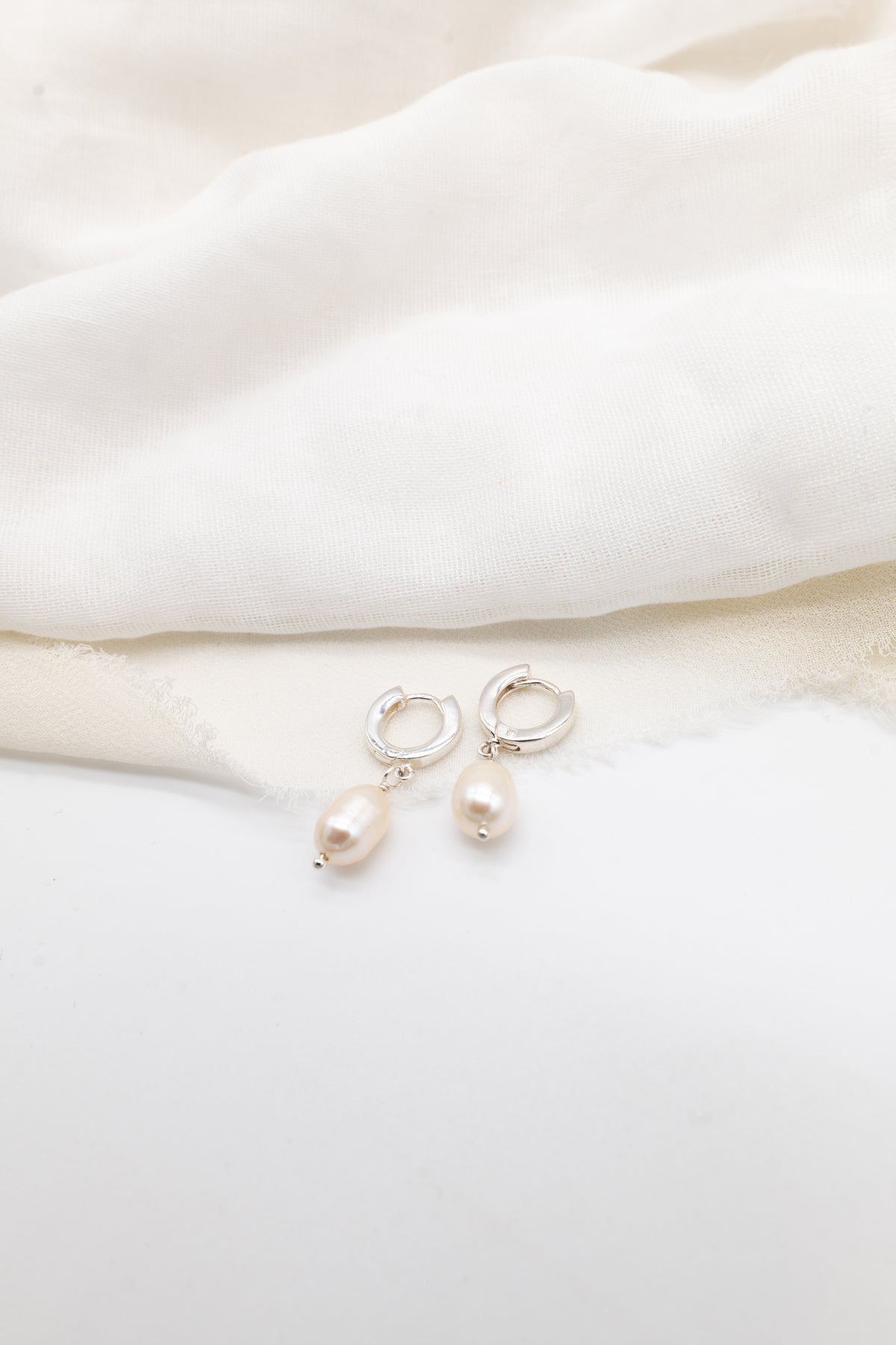 Sterling silver Pearl Huggy Hoops