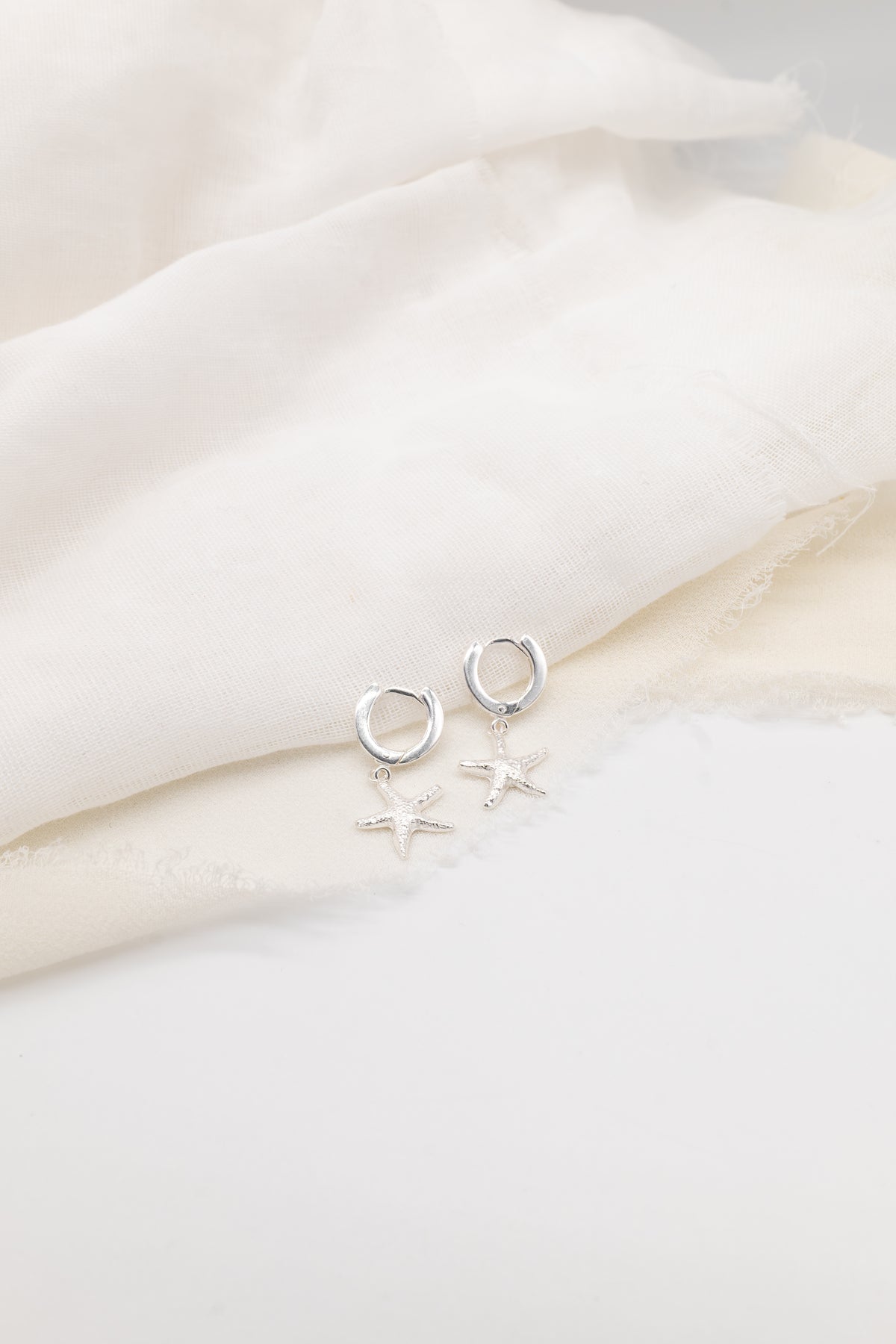 Sterling silver starfish hoops