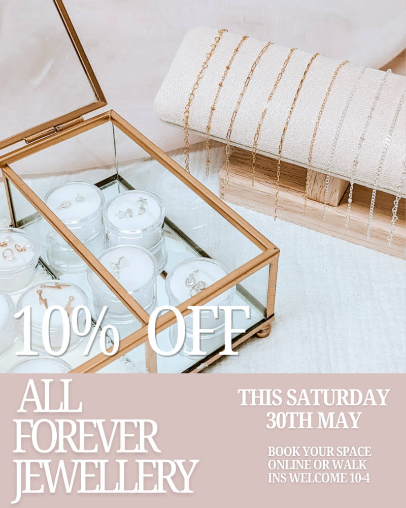 Glass jewelry box with candles and a towel on a table, promotional text overlay for 10% off jewelry.