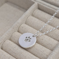 Milo Paw print disk necklace