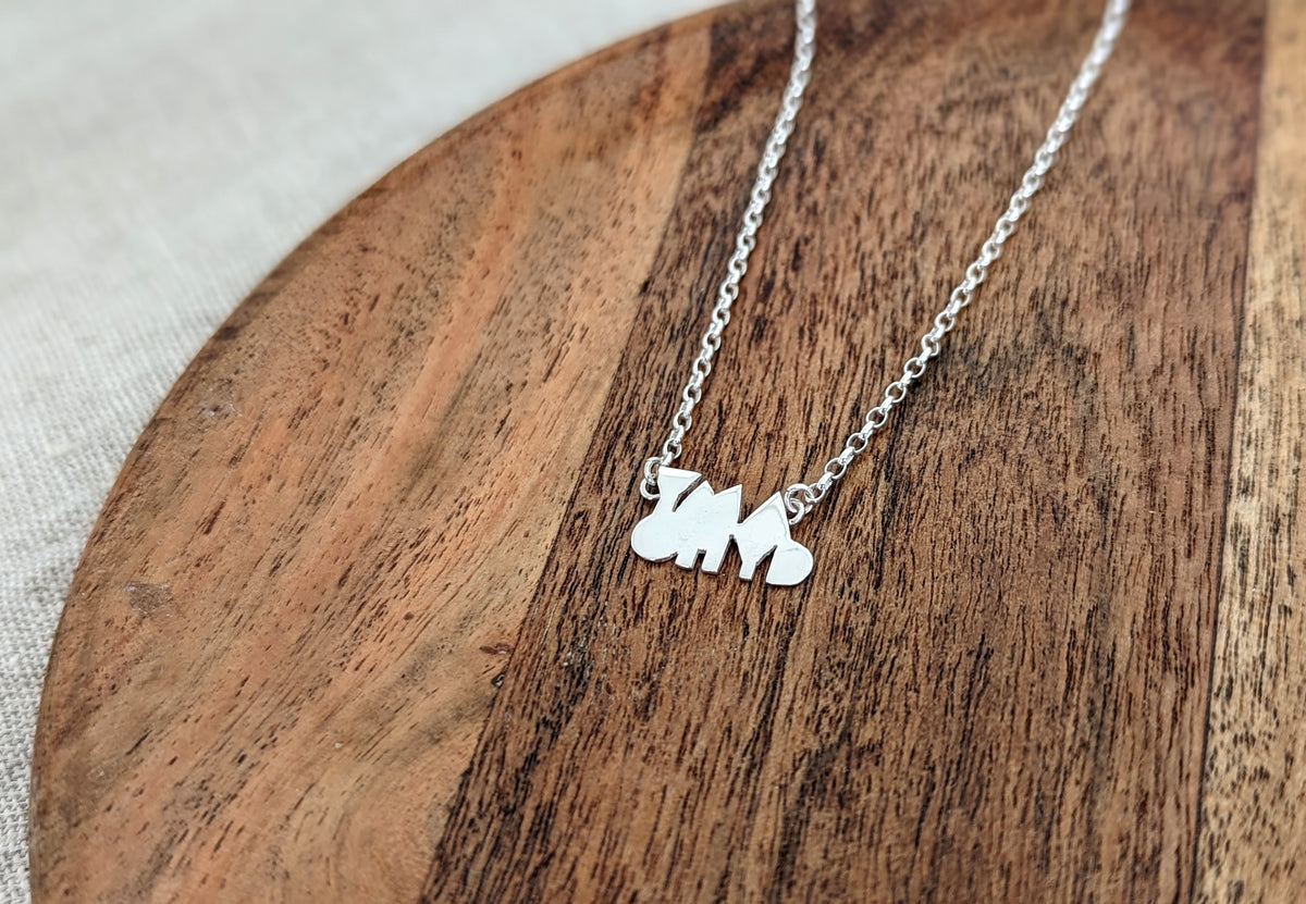 Sterling Silver Yma O Hyd necklace