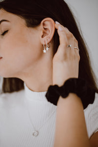 Silver star hoop earrings